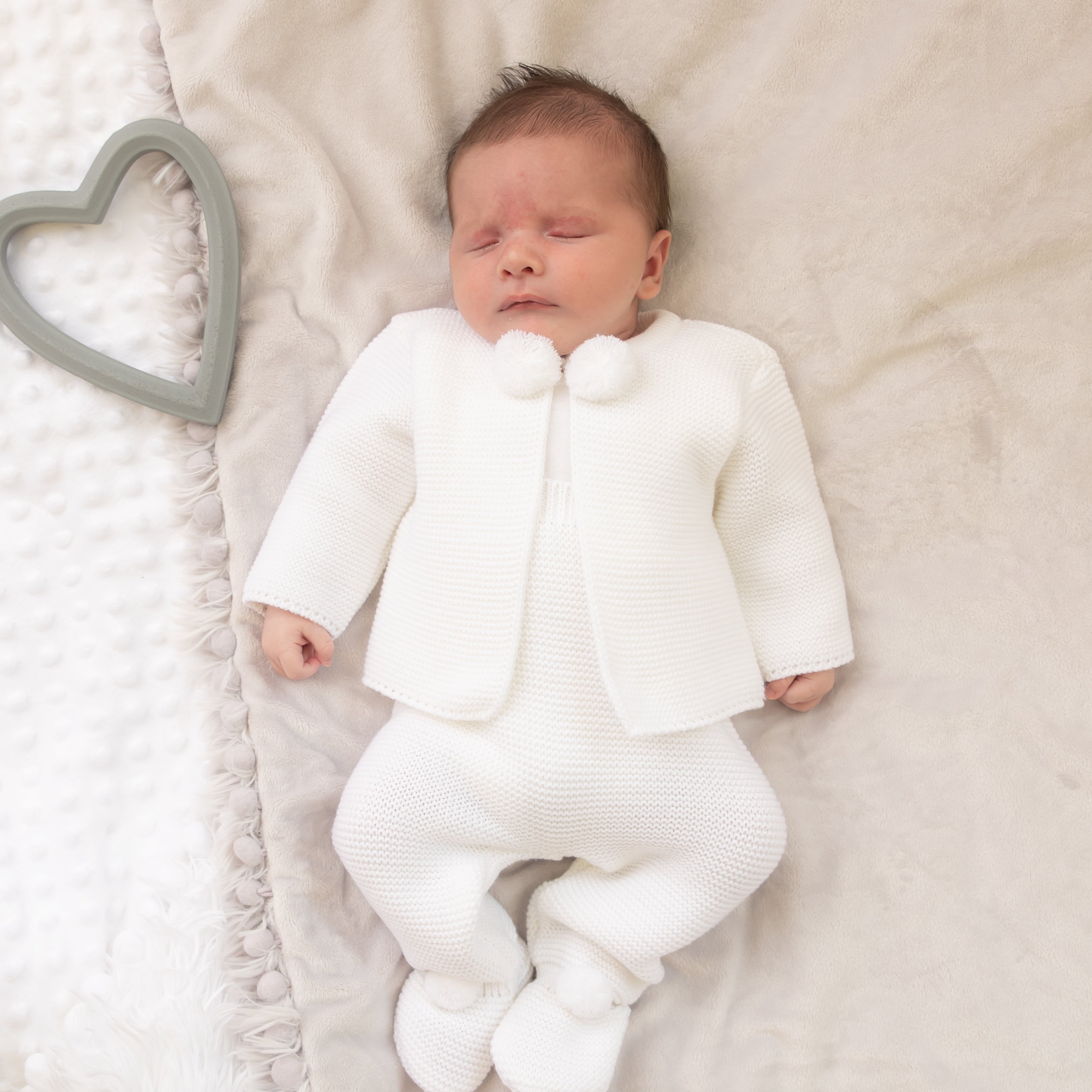 Knitted Baby Pom Pom Outfit In White Millie Ralph