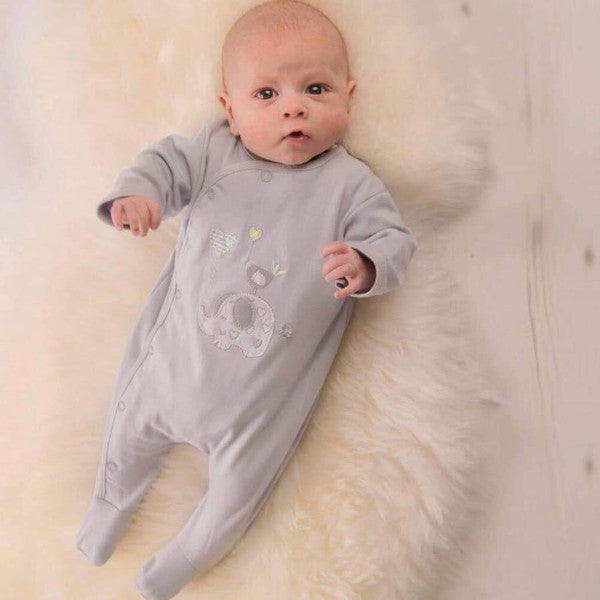 Baby wearing 'Elephant & Bird' grey unisex cotton sleepsuit