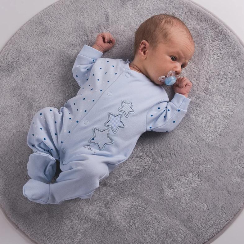 Baby wearing blue triple stars cotton sleepsuit