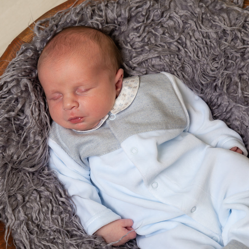 Sleeping baby wearing Blue Velour Tweed Panel Leaf Sleepsuit